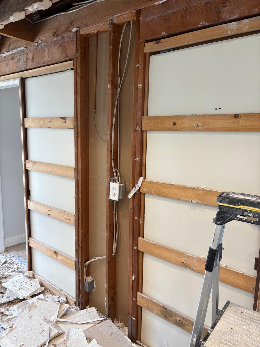 Electrician replacing outdated wiring