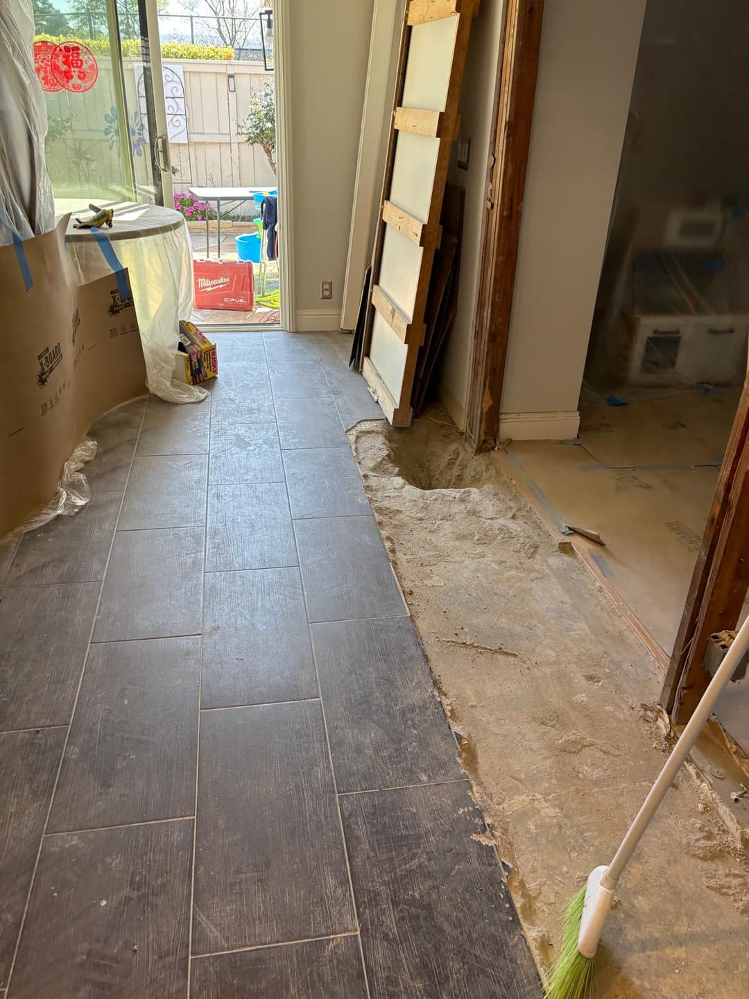 picture of new flooring being installed in a residential home